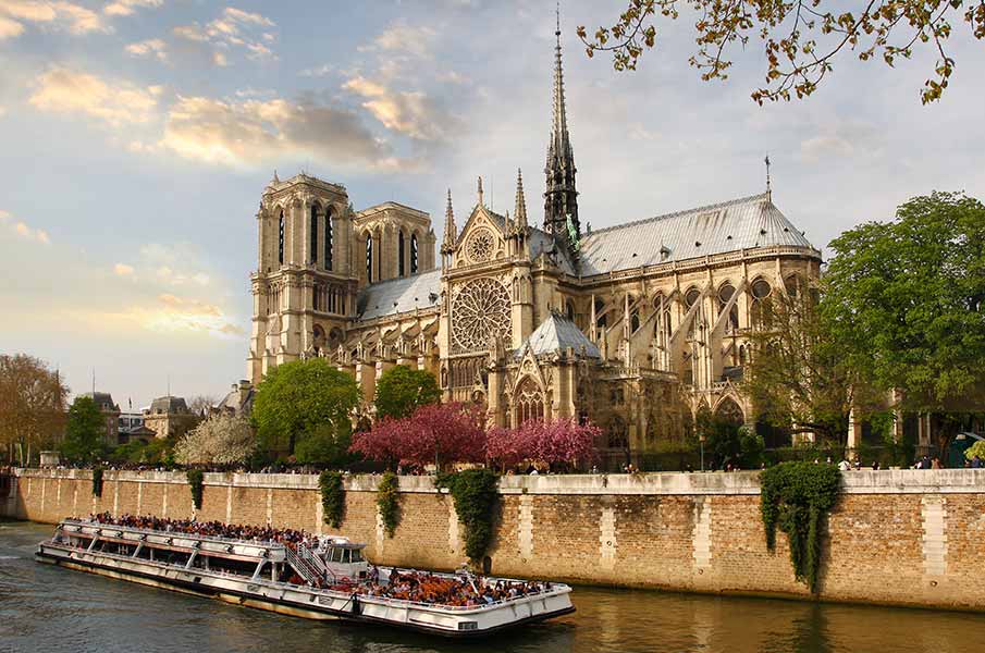 Paris, Notre Dame with boat on Seine, France